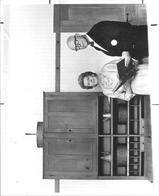 SA0705 - Photo of Edward D. and Faith Andrews by a Shaker cupboard.